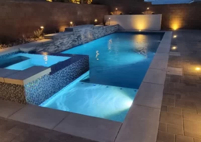 Enchanting Illuminated Backyard Pool Oasis